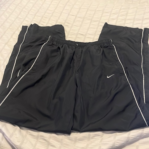 Nike Other - NEW nike embroidered track pants lined black size medium